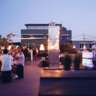 Summer Rooftop Networking With Skyline Views